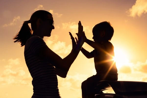Image of happy mother and child after resolving child arrangements West Glamorgan